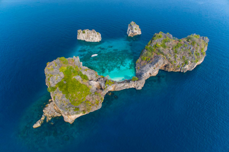 8 Best Islands for Snorkeling around Phuket - Boat in the Bay